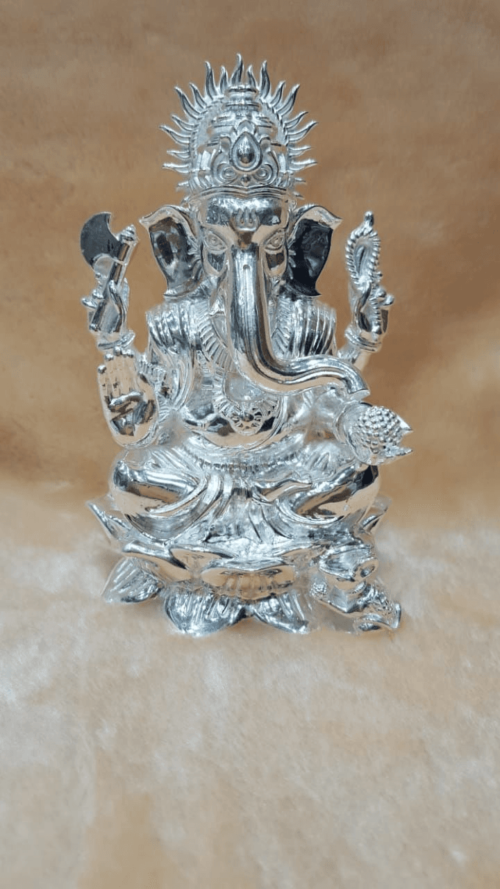 Silver deity figurine